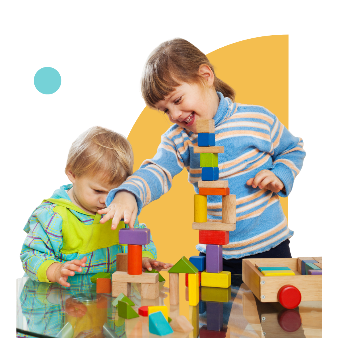 Children building colourful wooden blocks during a clinic-based behaviour therapy session in Liverpool, developing social interaction and teamwork skills.