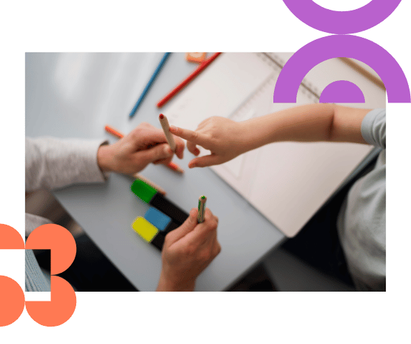 Parent reviewing their child’s NDIS autism plan with provider support.