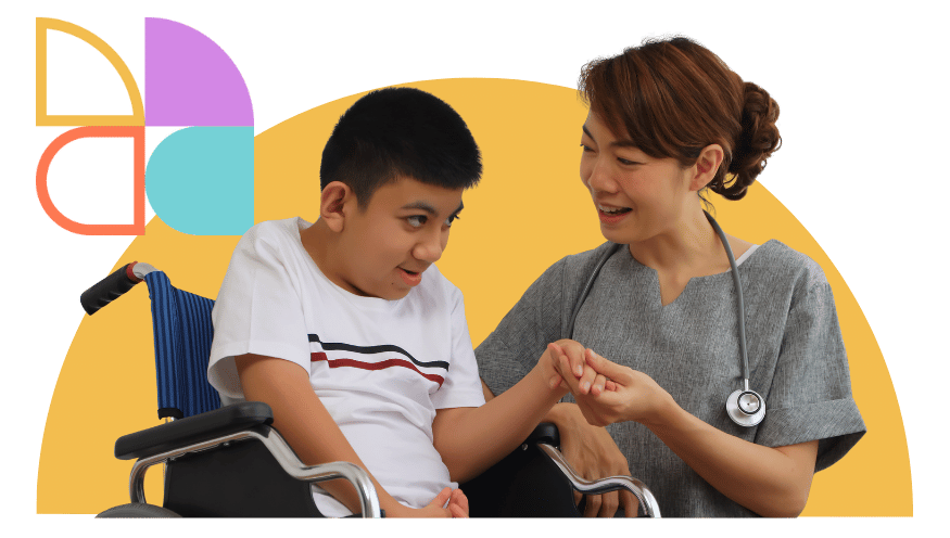 Support worker assisting a young participant in a wheelchair with care and encouragement, representing compassionate NDIS disability support and independent living.