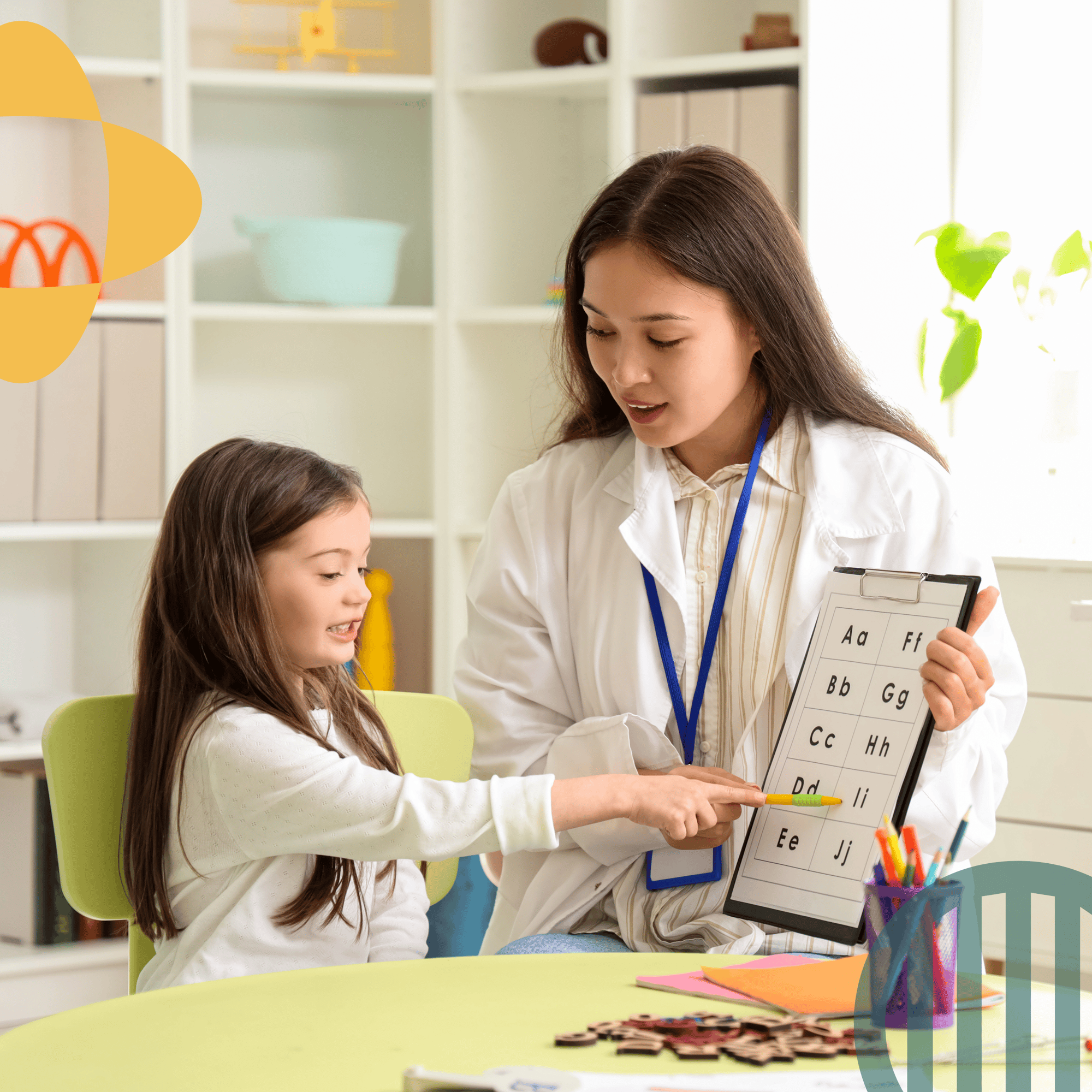 A newly hired speech therapist with kid in a session