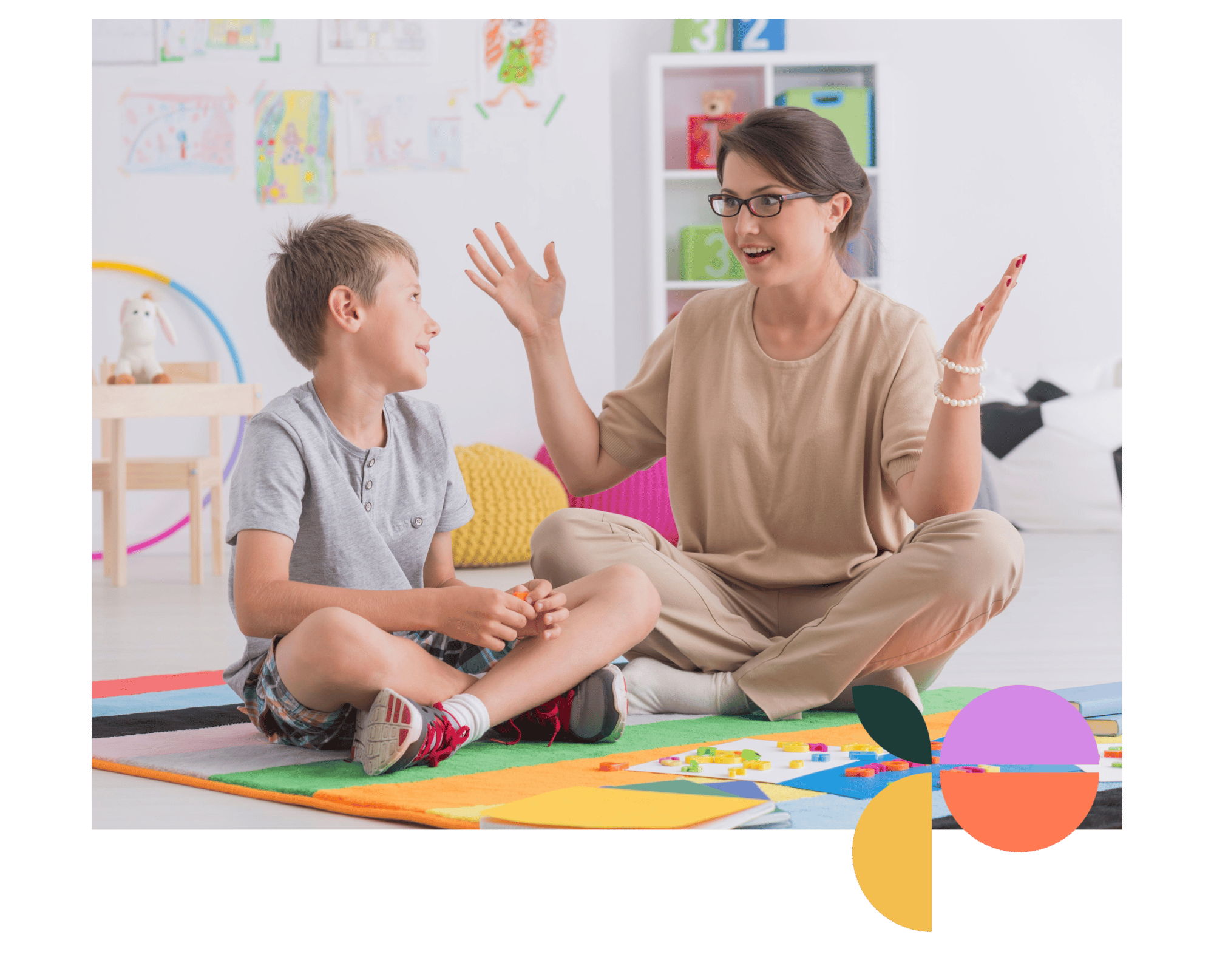 Behaviour therapist working with support worker to implement a comprehensive behaviour support plan in a school setting.