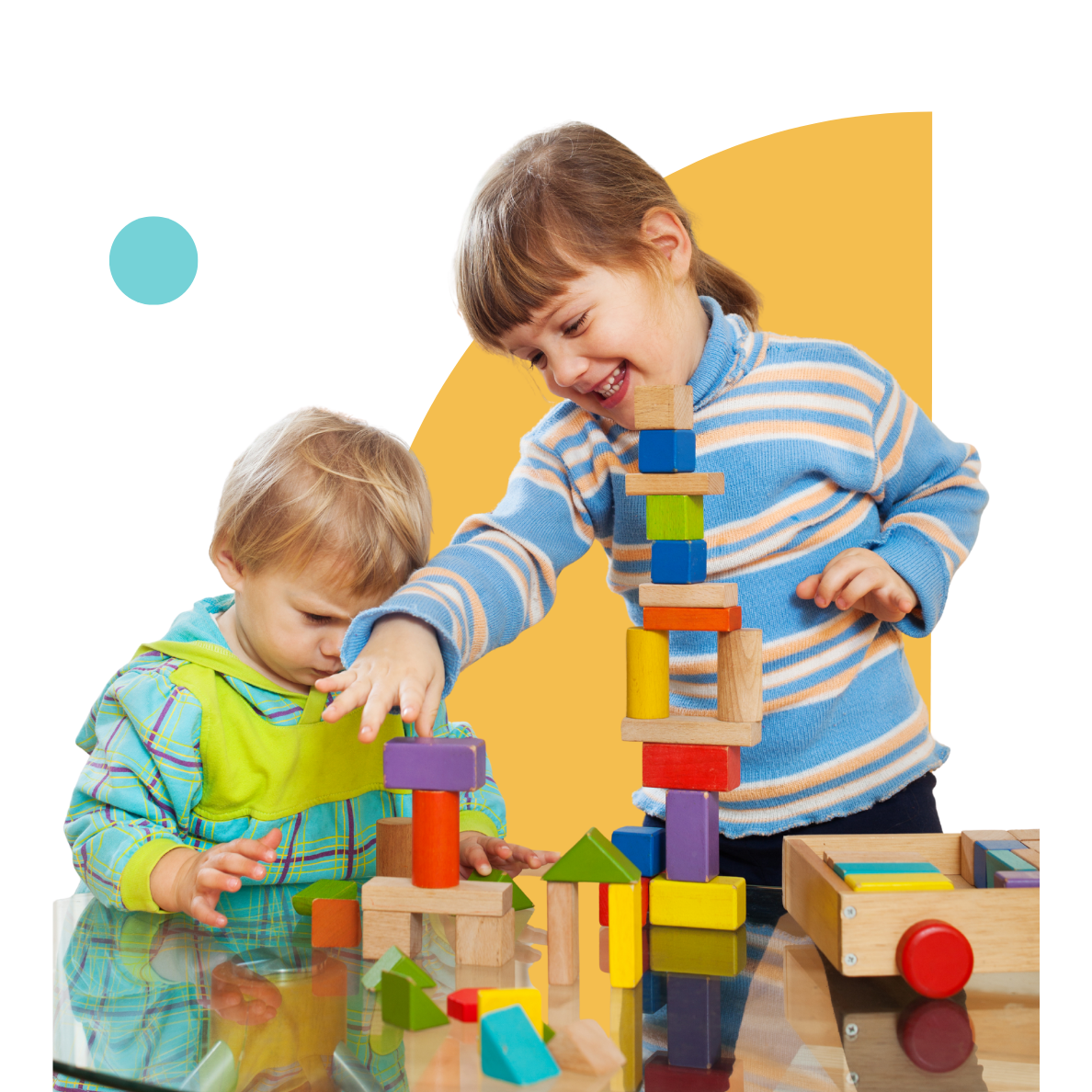 Children building colourful wooden blocks during a clinic-based behaviour therapy session in Liverpool, developing social interaction and teamwork skills.