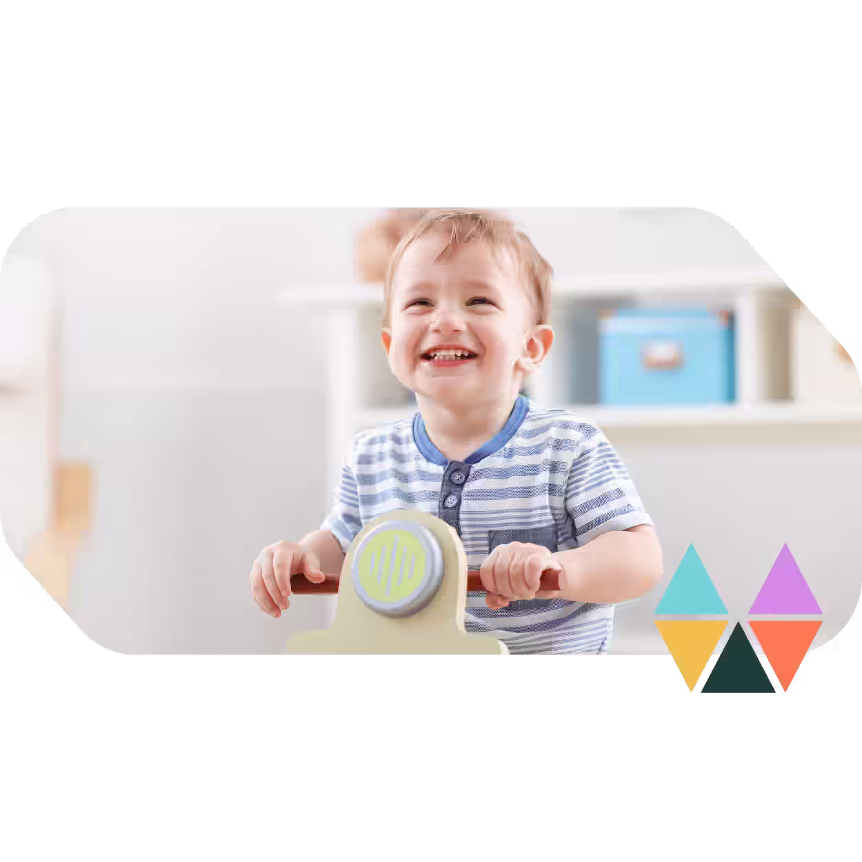 child at home happy and smiling playing with his toy as he enjoys a support from an ndis plan manager provider