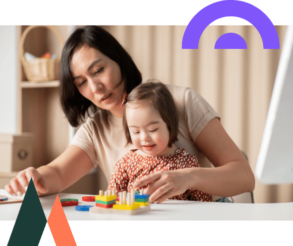 A child and a therapist in a autism therapy treatment session